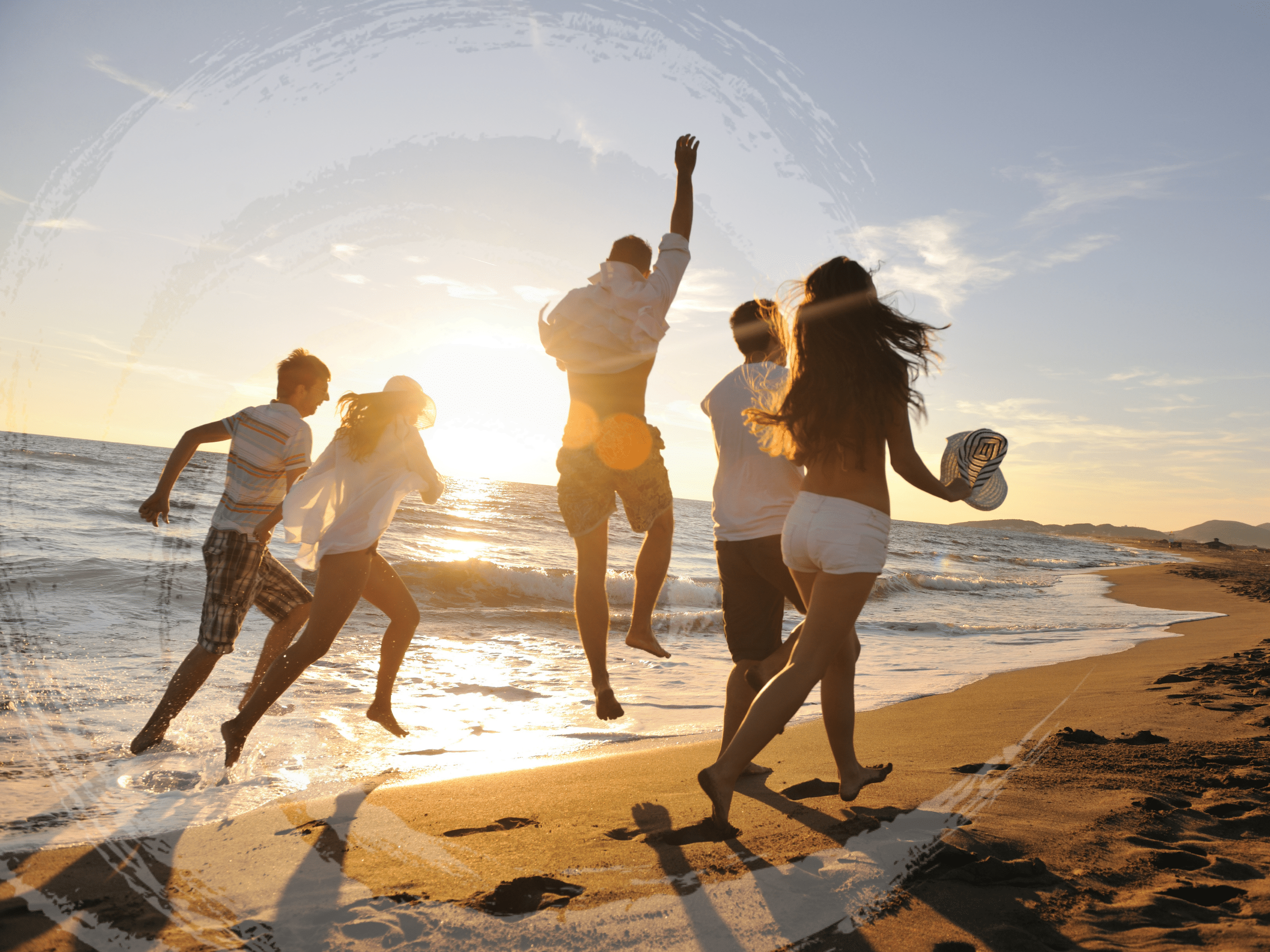 A group of people walking along the beach, symbolizing mental health and the history of Spravato
