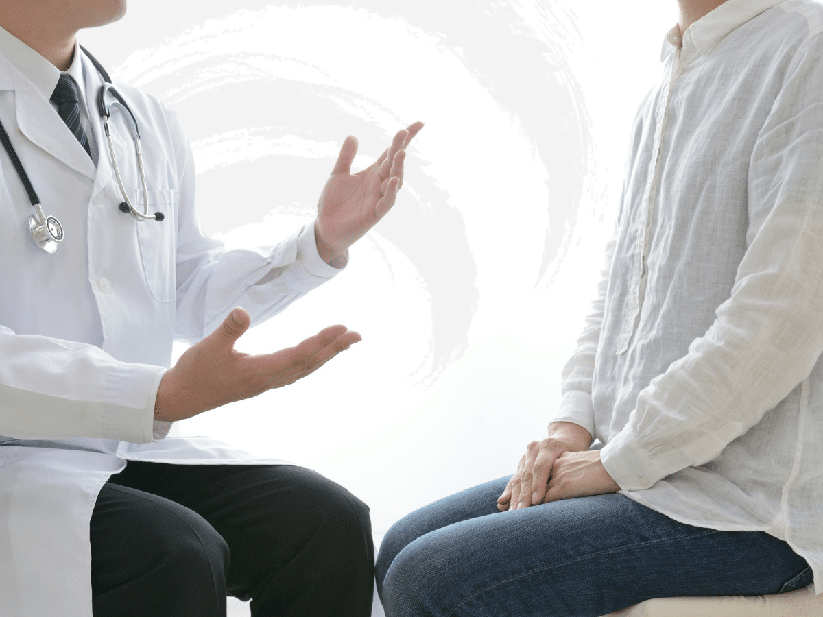 A doctor advising a patient, symbolizing what is medication management