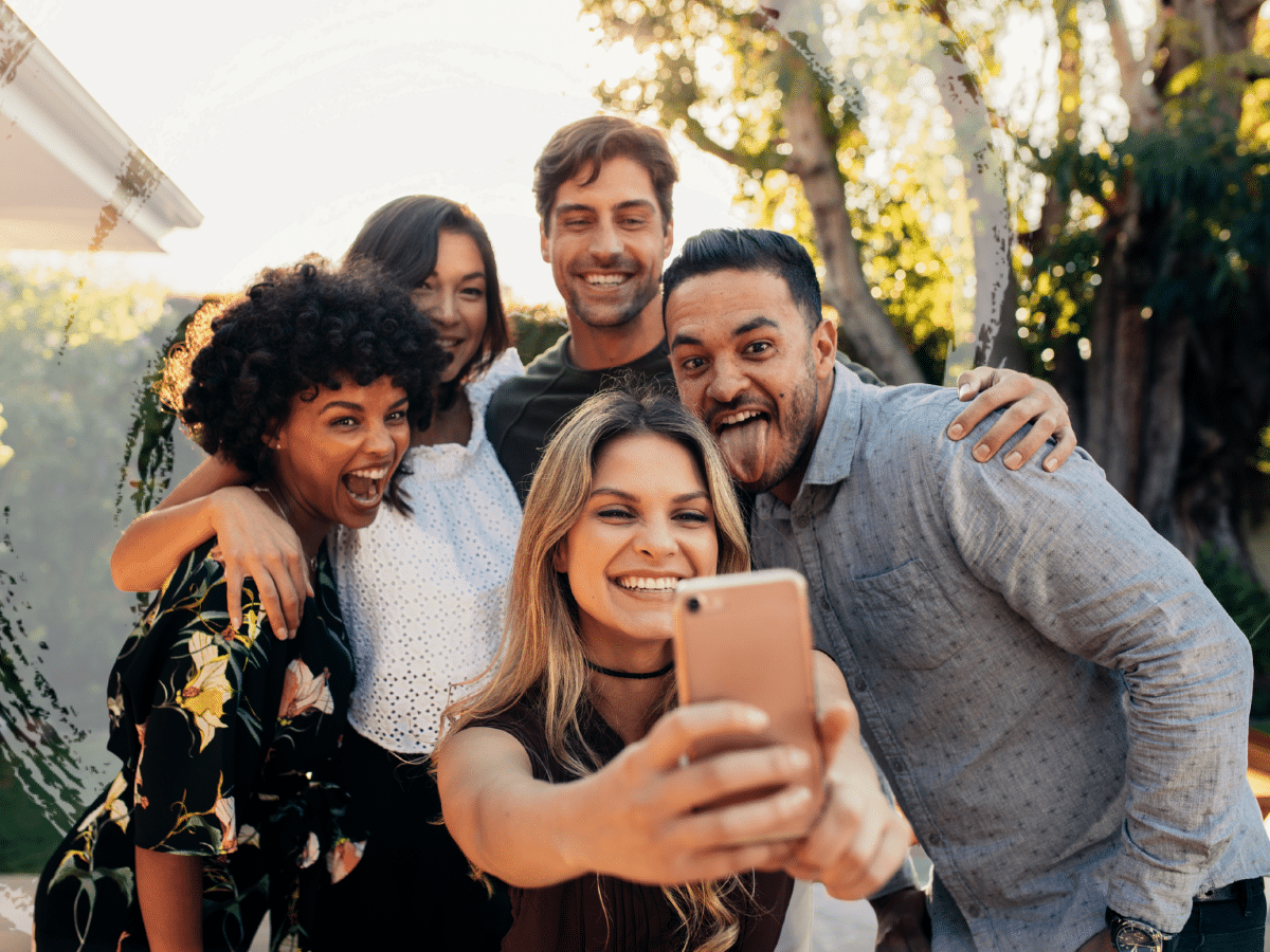A group of friends taking a selfie, symbolizing how some people can suffer from an anxiety disorder.
