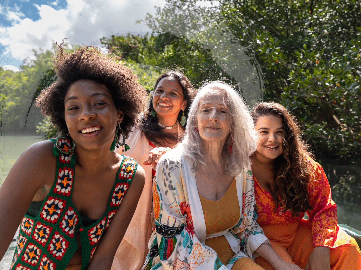 A group of women smiling, symbolizing perimenopause and mental health