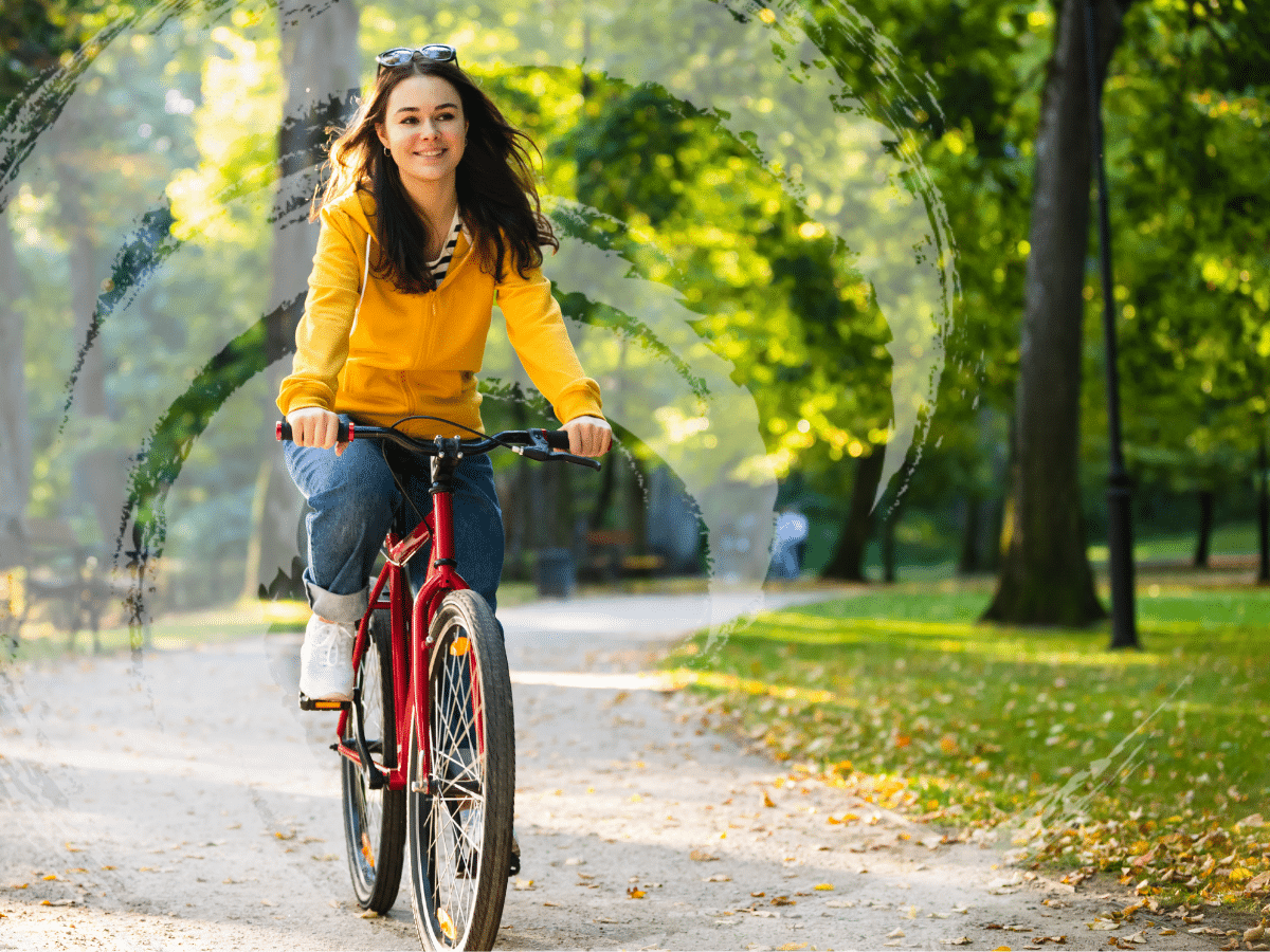 A woman riding a bike, symbolizing the patient question what is ketamine therapy